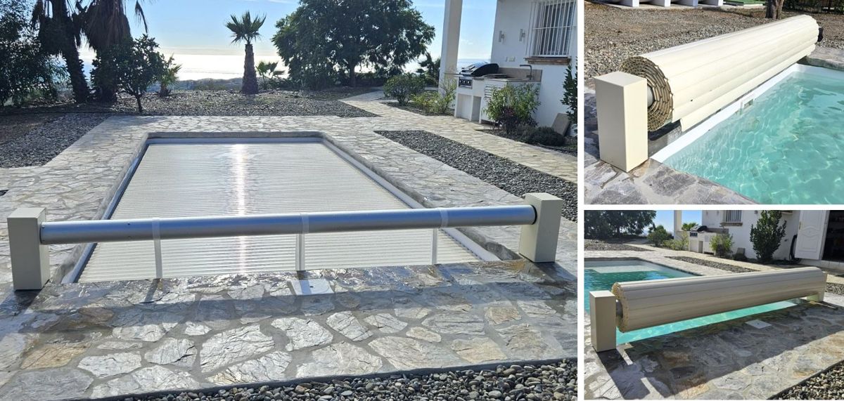 Neu gebautes Schwimmbecken mit einer Abdeckung aus PVC-Lamellen, die sich auf einer sichtbaren Achse aufrollt und robusten Schutz sowie ein modernes Finish bietet. Competa.