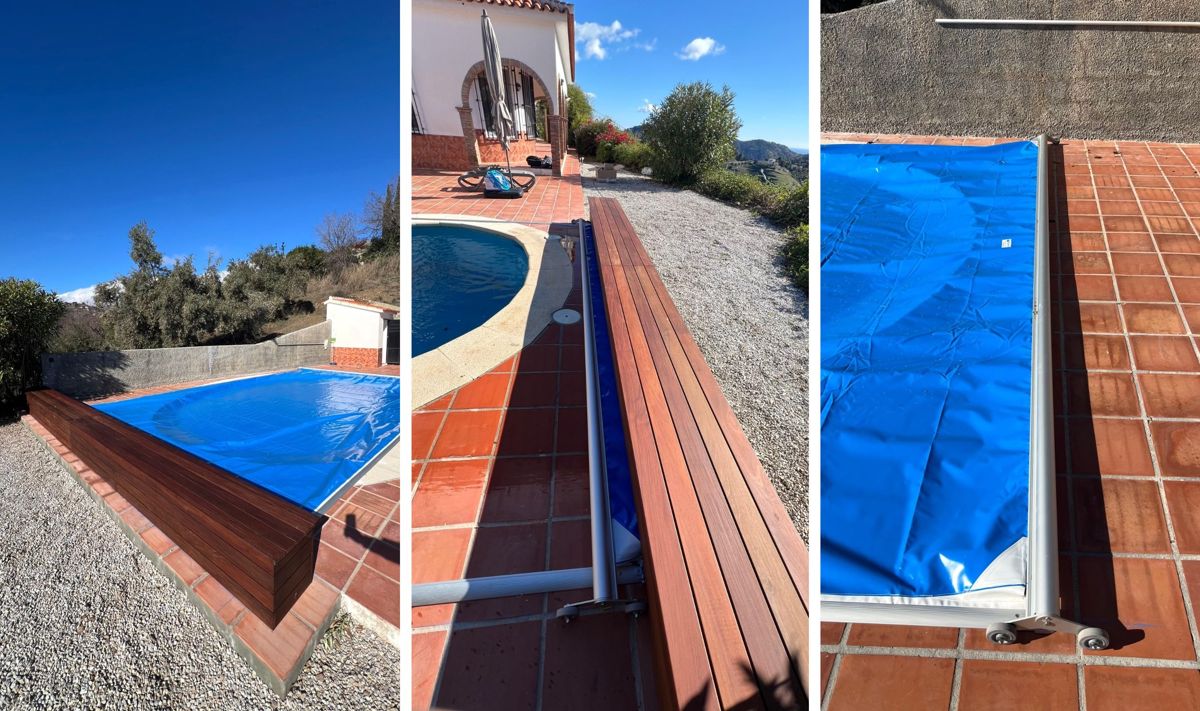 Schiebbare Poolabdeckung mit Schienen- und Rollensystem, perfekt integriert und vollständig unter einer Holzbank verborgen. Competa.